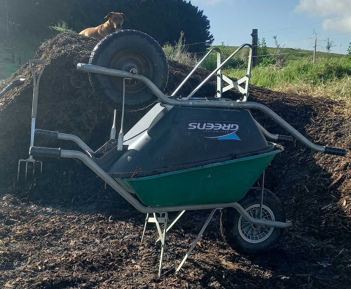 Two wheelbarrows in a '69' position - on on top of the other.