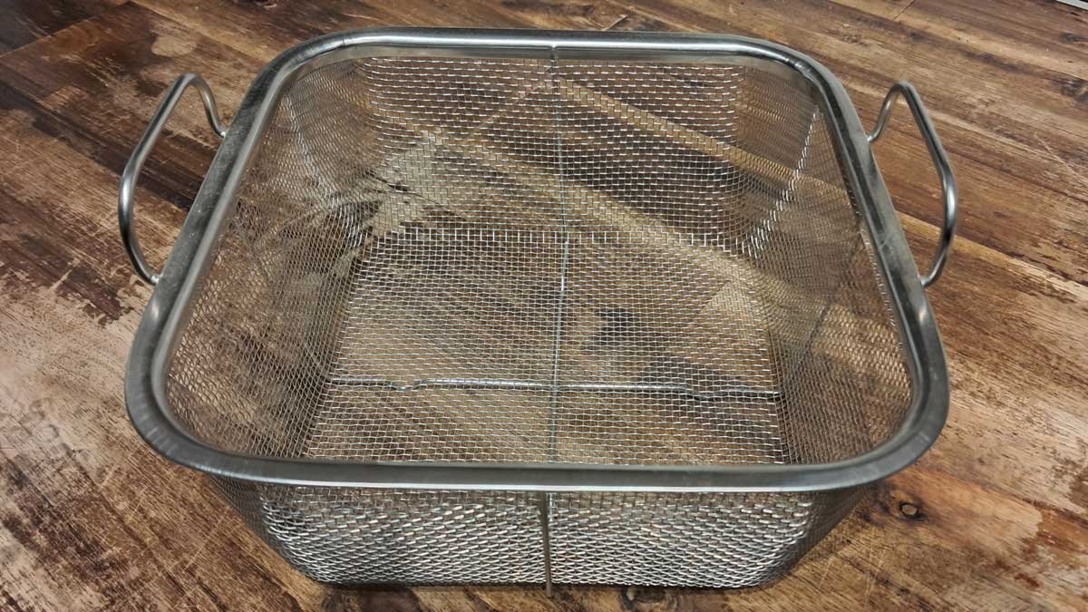 A wire basket I used for sifting off peanut skins. A wire basket I used for sifting off peanut skins.