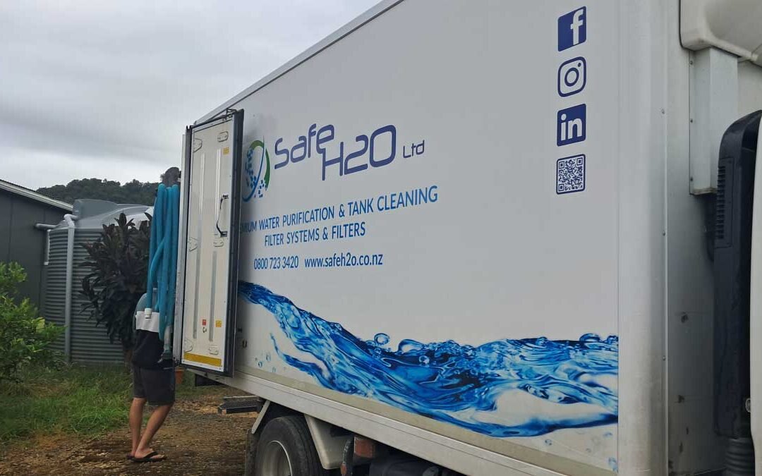 The Safe H2O truck backed up to our tank.