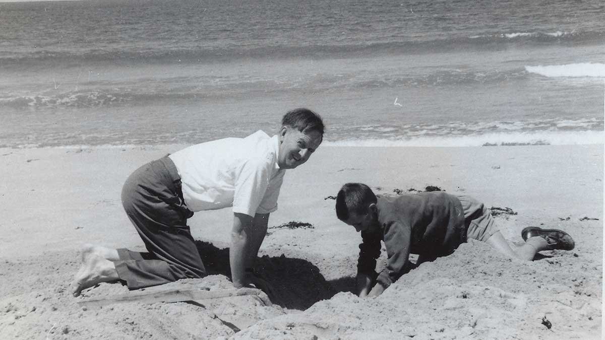 My father playing on the beach with his father in the 1960s.